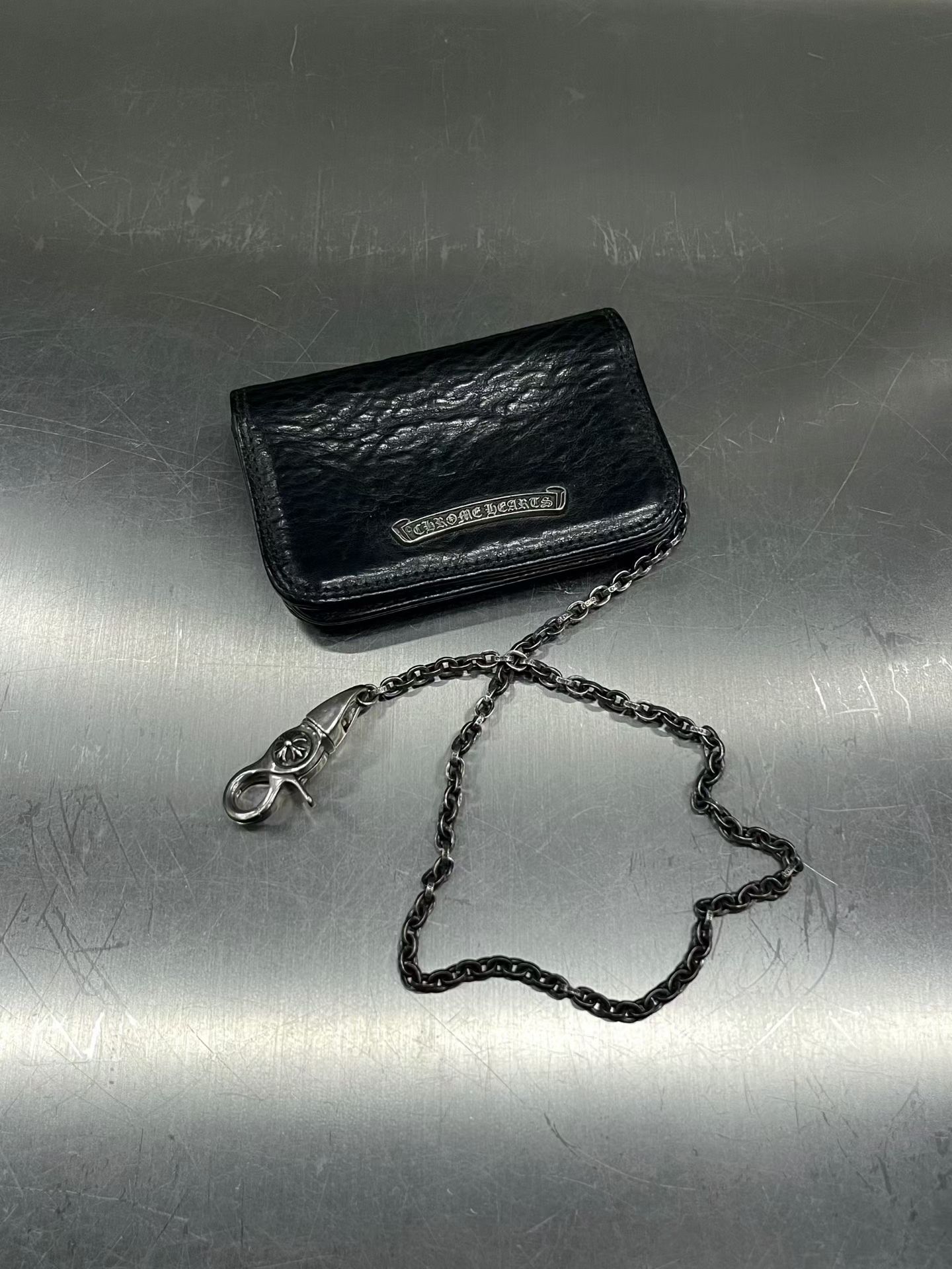 Chrome Hearts silver scroll-style cardholder/coin purse with lobster-claw belt chain., image 1